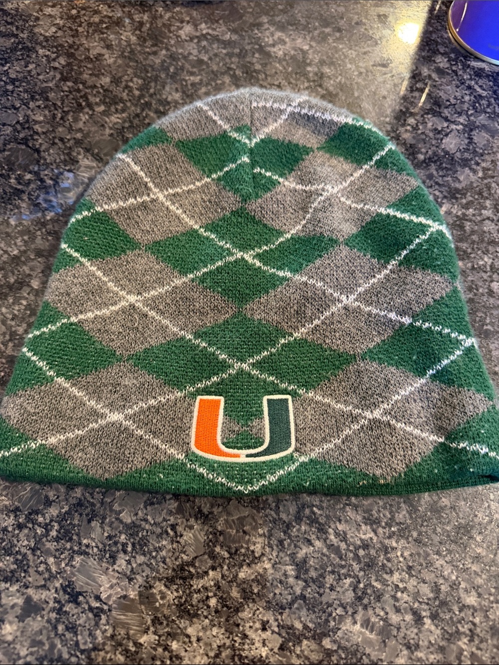 Green/gray Argyle Beanie with University of Miami Patch. One size